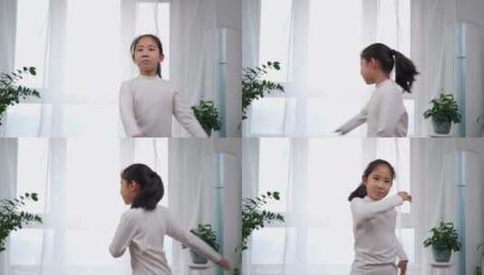 在家跳舞做操的亚洲女孩高清在线视频素材下载