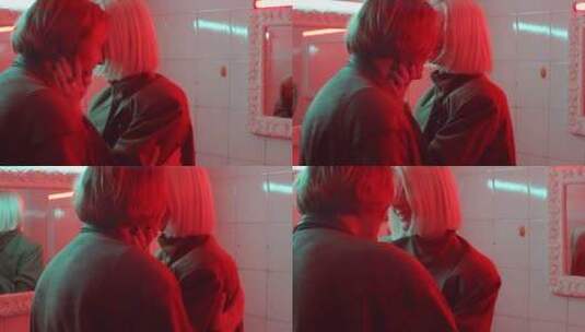 情侣在红色灯光的浴室里亲吻高清在线视频素材下载