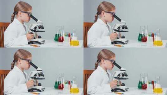 女孩使用显微镜后对着镜头微笑高清在线视频素材下载