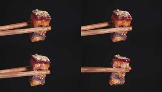 特写筷子夹起红烧肉高清在线视频素材下载