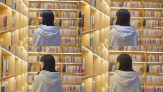 年轻女子图书馆书架前边走边查找书本高清在线视频素材下载