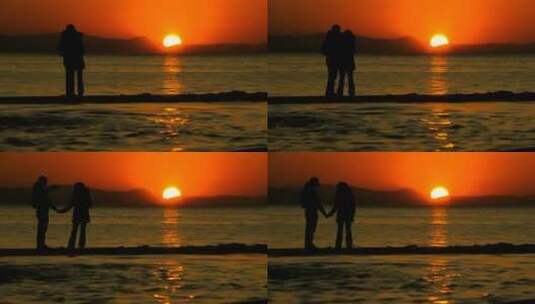 日落时在海边自拍的情侣高清在线视频素材下载