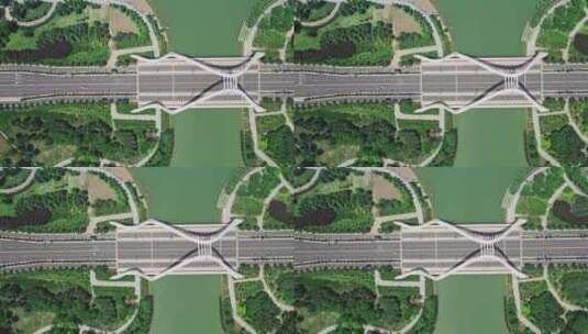 航拍郑州天健湖 城市公园 桥梁过车俯拍高清在线视频素材下载