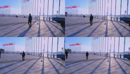 辽宁丹东鸭绿江岸城市广场旗帜飘扬高清在线视频素材下载