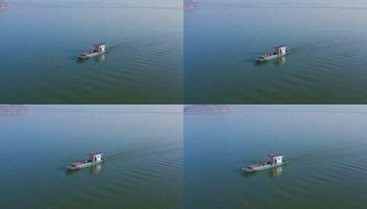 行驶在滇池湖面上的生态保洁船高清在线视频素材下载
