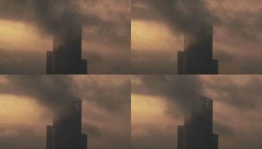 城市大厦沐浴在阳光下云雾环绕高清在线视频素材下载