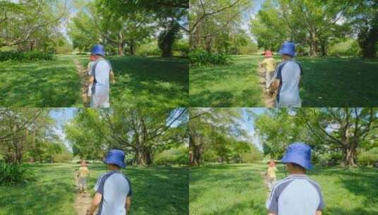 小朋友小学生亲近大自然草地玩耍奔跑高清在线视频素材下载