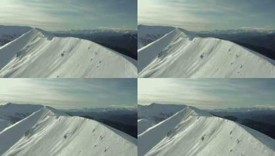 航拍的雪峰景观高清在线视频素材下载