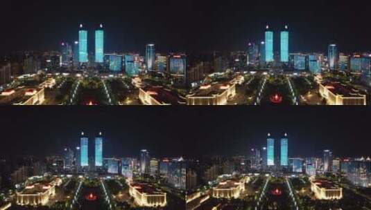 江西南昌绿地双子塔夜景灯光航拍高清在线视频素材下载