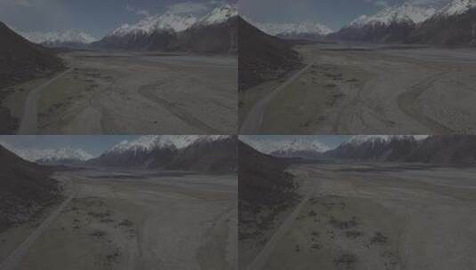 航拍两侧大山中间的道路高清在线视频素材下载