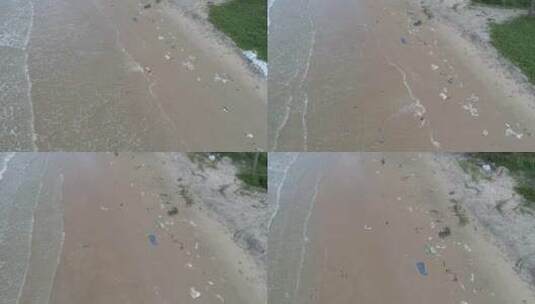 垃圾、塑料、垃圾、瓶子……海滩上的环境污染高清在线视频素材下载