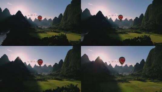 在山间飞行的热气球高清在线视频素材下载