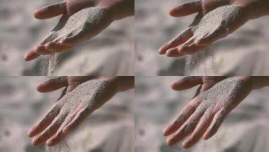 握不住的沙、沙子在指尖散落高清在线视频素材下载