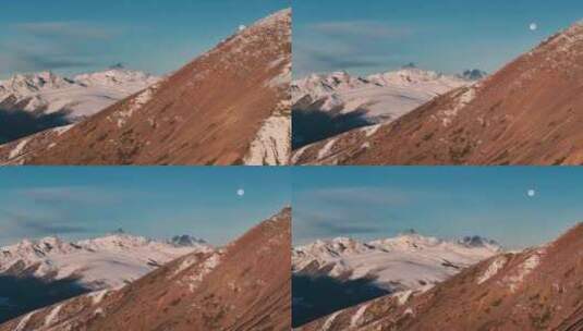 航拍月亮下的雪山高清在线视频素材下载