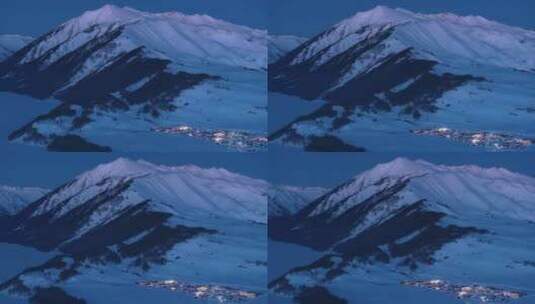 新疆阿勒泰冬季禾木村蓝调震撼航拍风景夜景高清在线视频素材下载