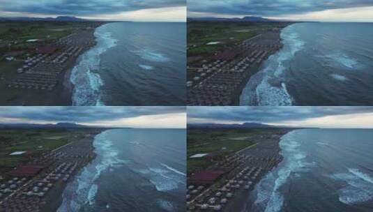 Arial视图：清晨沿海飞行：海浪、山脉高清在线视频素材下载