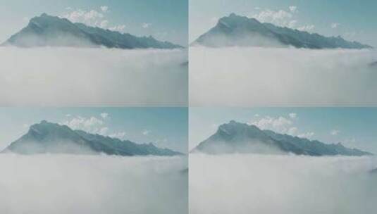 4k航拍雪山上的云雾高清在线视频素材下载