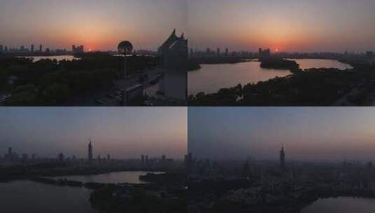 夕阳落日航拍南京玄武湖和紫峰大厦高清在线视频素材下载