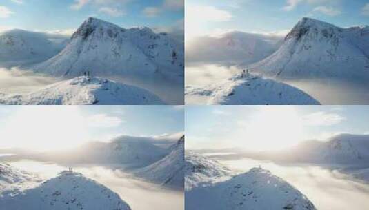 航拍登山者登顶雪山山峰励志登山_4K高清在线视频素材下载