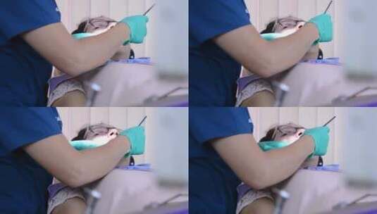 牙医给病人清洁牙齿高清在线视频素材下载