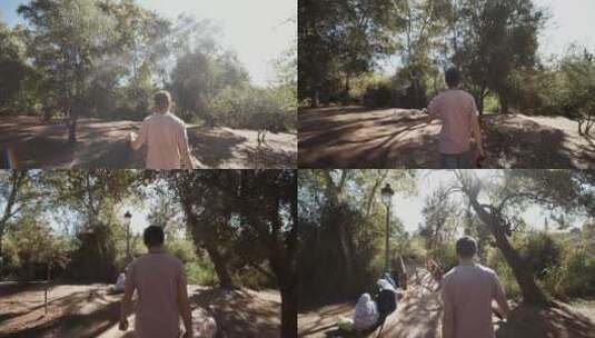 一名男子走在非洲的一个公园里_跟踪拍摄高清在线视频素材下载