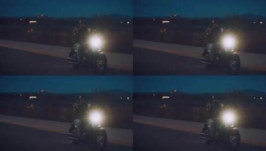 路灯下的摩托手高清在线视频素材下载
