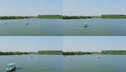 东莞航拍华阳湖湿地公园游船前进高清在线视频素材下载