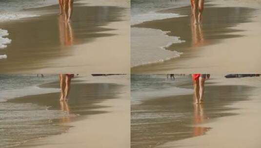 一名赤脚男子在海滩上散步高清在线视频素材下载