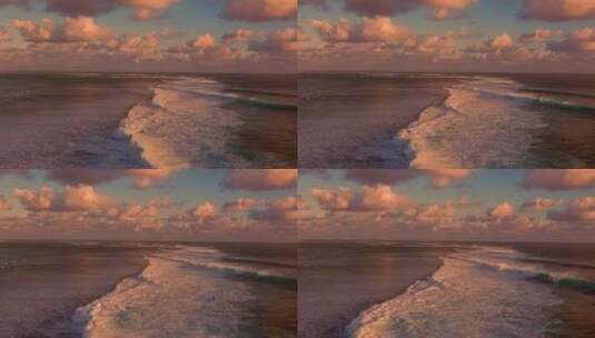 夕阳下的棉花云和波涛汹涌的海浪高清在线视频素材下载