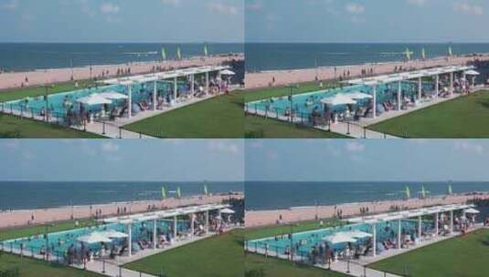 8k实拍盛夏的海边度假的人群高清在线视频素材下载