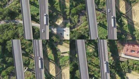 航拍高速公路上行驶的货车汽车高架桥高速路高清在线视频素材下载