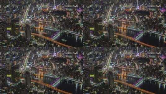 东京在夜晚照亮了城市景观和河流高清在线视频素材下载