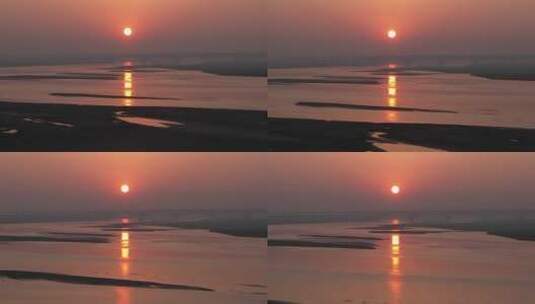 黄河滩涂上日落航拍高清在线视频素材下载