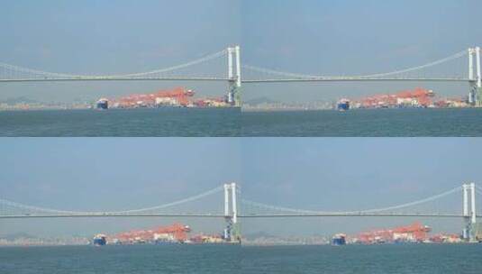 福建厦门港通过海沧大桥的集装箱货轮高清在线视频素材下载