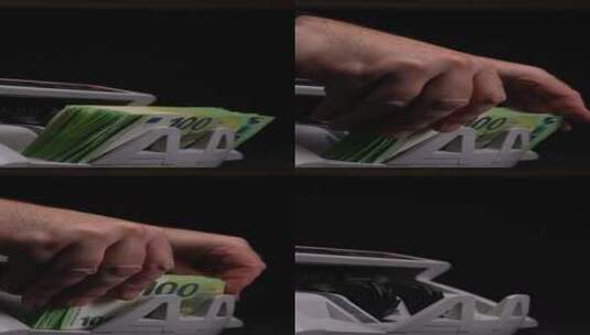 用点钞机数欧元纸币，垂直视频08高清在线视频素材下载