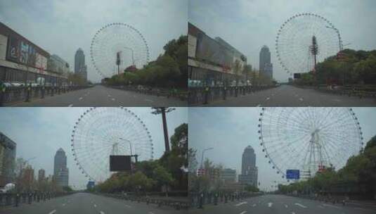 汽车窗外摩天轮风景道路交通城市建筑风光高清在线视频素材下载