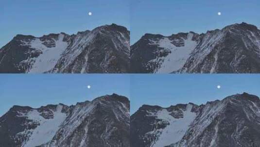 四川阿坝航拍月色下的岷山山脉四根香峰雪山高清在线视频素材下载