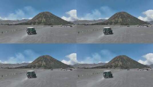 印尼布罗莫火山沙海航拍汽车越野自然风光高清在线视频素材下载