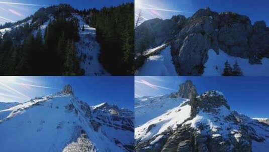 FPV航拍巍峨的山峰雪山山顶高山脉山脊高清在线视频素材下载