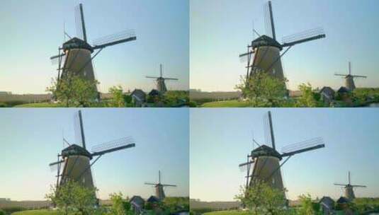 典型荷兰风景中的两个带固定叶片的风车Ki高清在线视频素材下载