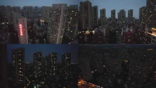 城市高楼小区万家灯火夜景傍晚航拍高清在线视频素材下载