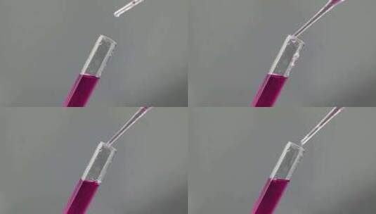 向试管里滴粉红色溶液高清在线视频素材下载