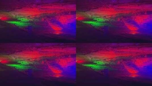 五彩灯光照射下的溶洞景观高清在线视频素材下载