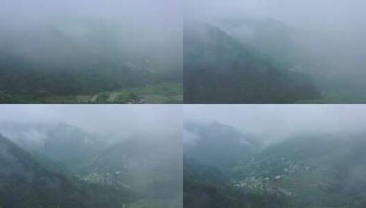 4K航拍穿越云雾大山看见原生态村寨高清在线视频素材下载