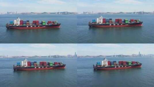 航拍货轮满载集装箱从海上航行高清在线视频素材下载