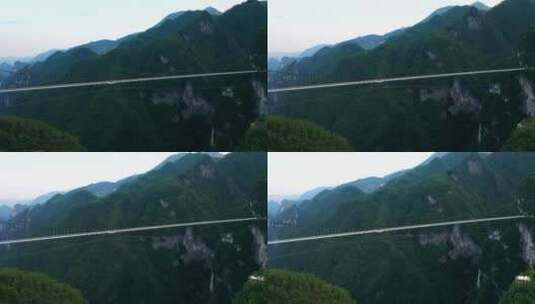 4K航拍俯拍桃溪谷景区玻璃栈道悬索桥高清在线视频素材下载