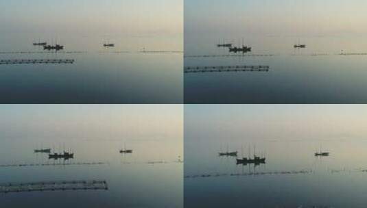 湖泊渔船破晓晨曦4K24帧高清在线视频素材下载