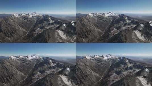航拍川西蓝天下纯净的雪山高清在线视频素材下载