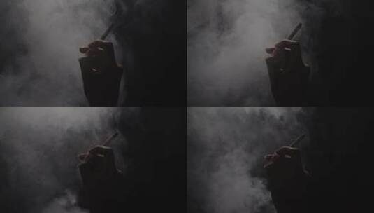 一只手叼着香烟烟雾慢镜头7高清在线视频素材下载