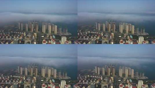 平流雾下的华润湾九里海边楼宇高清在线视频素材下载